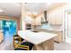 Modern kitchen with large island and stainless steel appliances at 2246 Fiesta Dr, Sarasota, FL 34231