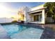 Inviting swimming pool in a modern, sun-drenched backyard at 2246 Fiesta Dr, Sarasota, FL 34231