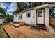 Spacious backyard with a wooden deck and seating area at 2883 16Th Ave N, St Petersburg, FL 33713