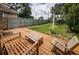 Wooden deck and grassy backyard with seating at 2883 16Th Ave N, St Petersburg, FL 33713
