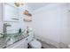 Clean bathroom with a glass vessel sink and updated fixtures at 2883 16Th Ave N, St Petersburg, FL 33713