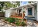 Charming bungalow with a covered porch, well-manicured landscaping, and a spacious yard at 2883 16Th Ave N, St Petersburg, FL 33713