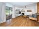 Bright living room featuring a cozy sectional sofa and a fireplace at 2883 16Th Ave N, St Petersburg, FL 33713