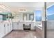 Large bathroom with double vanity and soaking tub at 3278 Woodland Brook Way, Wesley Chapel, FL 33543