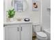 Bright bathroom with white vanity and bathtub at 3278 Woodland Brook Way, Wesley Chapel, FL 33543
