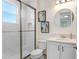 Clean bathroom with walk-in shower and white vanity at 3278 Woodland Brook Way, Wesley Chapel, FL 33543