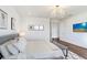Main bedroom with king-size bed and stylish decor at 3278 Woodland Brook Way, Wesley Chapel, FL 33543