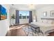 Main bedroom with large bed and a view at 3278 Woodland Brook Way, Wesley Chapel, FL 33543