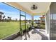 Relaxing screened porch overlooking a pond at 3278 Woodland Brook Way, Wesley Chapel, FL 33543