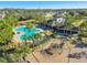 Community pool, playground, and clubhouse at 35980 Morse Willow Ct, Zephyrhills, FL 33541