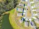 Community overview showing homes and a central pond at 35980 Morse Willow Ct, Zephyrhills, FL 33541
