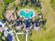 Community pool, playground, and clubhouse at 35980 Morse Willow Ct, Zephyrhills, FL 33541
