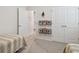 bedroom with twin beds, wall decor, and closet at 35980 Morse Willow Ct, Zephyrhills, FL 33541