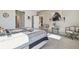 Spacious bedroom with cozy sitting area and large bed at 35980 Morse Willow Ct, Zephyrhills, FL 33541