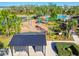 Aerial view of community amenities including playground, pool, and mailbox area at 35980 Morse Willow Ct, Zephyrhills, FL 33541