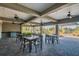Covered patio area with tables and chairs near playground at 35980 Morse Willow Ct, Zephyrhills, FL 33541