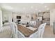 Farmhouse style dining room with seating for six at 35980 Morse Willow Ct, Zephyrhills, FL 33541