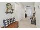 Bright and airy entryway with decorative accents at 35980 Morse Willow Ct, Zephyrhills, FL 33541