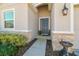 Inviting front door entrance with stonework and landscaping at 35980 Morse Willow Ct, Zephyrhills, FL 33541