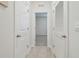 Hallway with doors to bedrooms and additional rooms at 35980 Morse Willow Ct, Zephyrhills, FL 33541