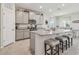 Spacious kitchen with granite countertops and gray cabinets at 35980 Morse Willow Ct, Zephyrhills, FL 33541