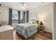 Bedroom with a double bed, water view, and built-in shelving at 4687 Alisa Ne Cir, St Petersburg, FL 33703