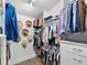 Spacious walk-in closet with ample shelving and hanging space for clothes at 4687 Alisa Ne Cir, St Petersburg, FL 33703