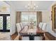 Elegant dining room with farmhouse table and neutral decor at 4687 Alisa Ne Cir, St Petersburg, FL 33703