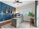 Spacious home office with built-in shelving and hardwood floors at 4687 Alisa Ne Cir, St Petersburg, FL 33703