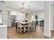 Bright kitchen with large island, white cabinets and hardwood floors at 4687 Alisa Ne Cir, St Petersburg, FL 33703
