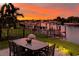 Outdoor patio with table and chairs, offering sunset views at 4687 Alisa Ne Cir, St Petersburg, FL 33703