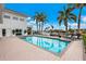 Refreshing pool with patio and lounge chairs, offering waterfront views at 4687 Alisa Ne Cir, St Petersburg, FL 33703