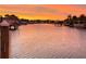 Serene waterfront view at sunset, showcasing the property's peaceful location at 4687 Alisa Ne Cir, St Petersburg, FL 33703