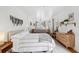 Serene bedroom with a double bed, light walls, and hardwood floors at 5107 27Th S Ave, Gulfport, FL 33707