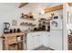 Cozy kitchen with white cabinets and wooden accents at 5107 27Th S Ave, Gulfport, FL 33707