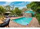 Relax by the refreshing pool with patio furniture at 5107 27Th S Ave, Gulfport, FL 33707
