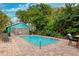 Sparkling clean rectangular pool in a tropical setting at 5107 27Th S Ave, Gulfport, FL 33707