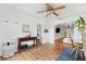 Bright sunroom features terracotta tile floors, built-in workspace, and access to backyard at 5107 27Th S Ave, Gulfport, FL 33707