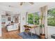 Bright and airy sunroom with a workspace, offering views of the backyard at 5107 27Th S Ave, Gulfport, FL 33707
