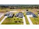 Aerial view of a house with a pool at 5226 Lake Venice Dr, Wimauma, FL 33598