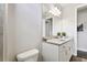 Clean bathroom with white vanity and gray countertop at 5226 Lake Venice Dr, Wimauma, FL 33598