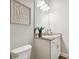 Small bathroom with white vanity and gray countertop at 5226 Lake Venice Dr, Wimauma, FL 33598