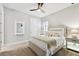 Serene bedroom with a queen bed, soft textiles, and calming tones at 5226 Lake Venice Dr, Wimauma, FL 33598