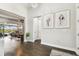 Bright hallway with view into living room and pool at 5226 Lake Venice Dr, Wimauma, FL 33598