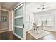 Home office with barn door and hardwood floors at 5226 Lake Venice Dr, Wimauma, FL 33598