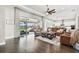 Open living space with access to the kitchen and pool at 5226 Lake Venice Dr, Wimauma, FL 33598