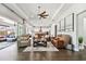Living area with access to the pool and patio at 5226 Lake Venice Dr, Wimauma, FL 33598