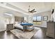 Spacious main bedroom with large windows and hardwood floor at 5226 Lake Venice Dr, Wimauma, FL 33598