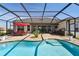 Large pool and patio perfect for entertaining at 5226 Lake Venice Dr, Wimauma, FL 33598