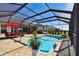 Resort-style pool with a screened enclosure and patio at 5226 Lake Venice Dr, Wimauma, FL 33598